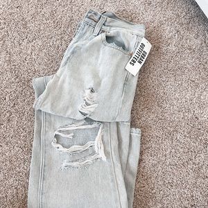 light wash ripped bootcut urban jeans